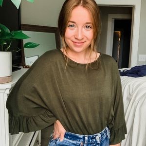 Free people body suit with ruffle sleeve